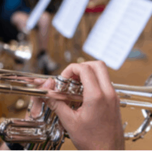 Fingers playing trumpet