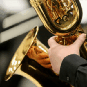 hand playing saxaphone